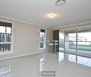 Spacious Family Home with Multiple Living Areas - Photo 3