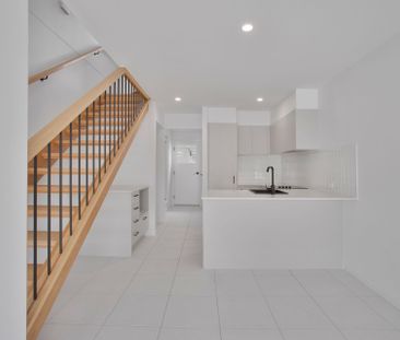 Brand New Modern Townhouse in Family Friendly Area! - Photo 1