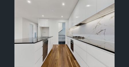 This luxury 4 bedroom residence is the front one on a block of two in a fabulous location. - Photo 4