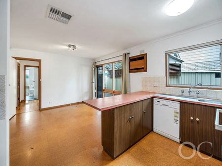 Open the Door to Family-Sized Comfort in a Quiet Netley Haven - Photo 2