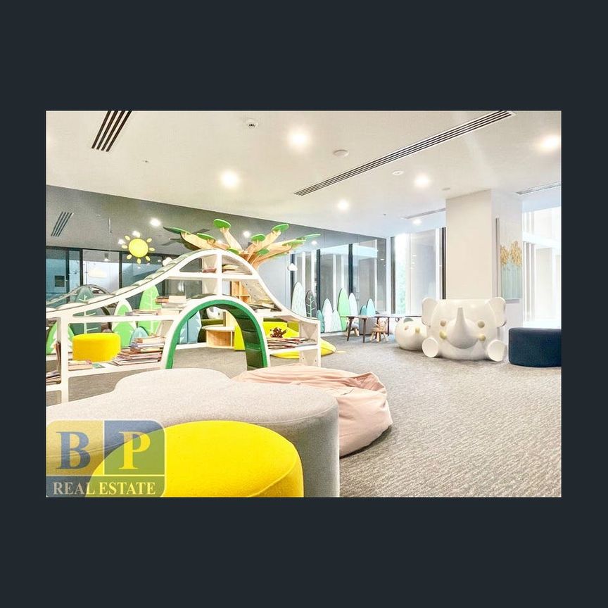 Sky and Tree Top View Apartment on Level 13 - Photo 1