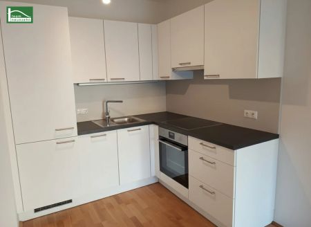 Eigener Garten mitten in der Stadt! Hofseitige 2-Zimmer-Wohnung mit toller Ausstattung - Photo 4