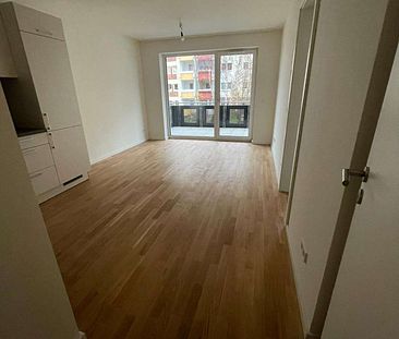 KfW 40-Neubau-Wohnung mit EBK, Balkon, Echtholzparkett, HWR, Fahrstuhl, Tiefgarage - Photo 2