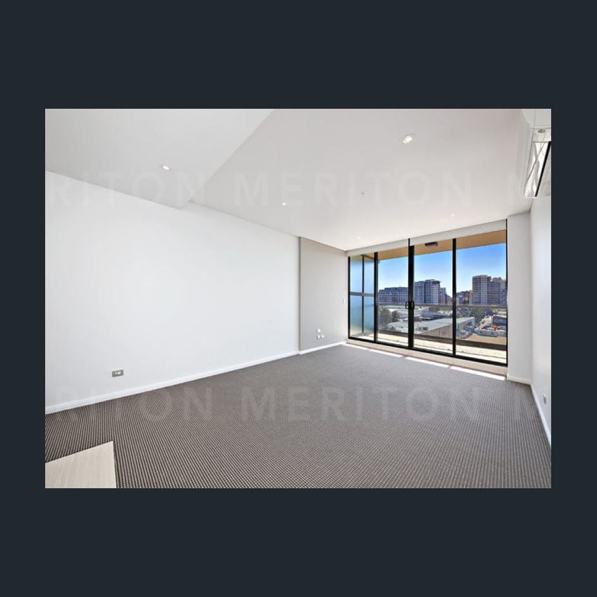 2 BEDROOM APARTMENT WITH PARKING NEXT DOOR TO EAST VILLAGE SHOPPING CENTRE! - Photo 1