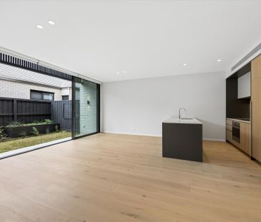 Gorgeous Modern Home with Light-Filled Living - Photo 4