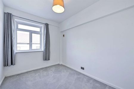 This recently redecorated apartment features underground parking, a spacious sitting room with French doors to a private terrace, a contemporary kitchen, three bedrooms, and bathroom. - Photo 3