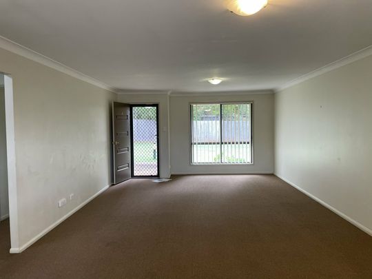 Lovely 2 bedroom brick unit - No Pets - Photo 1