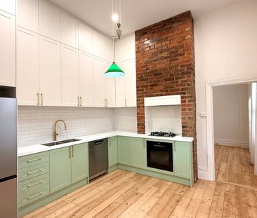 Charming Renovated Victorian with Designer Finishes & Studio Space - Photo 3