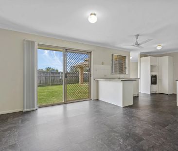 Four bedroom home with air conditioning on large block.. - Photo 1