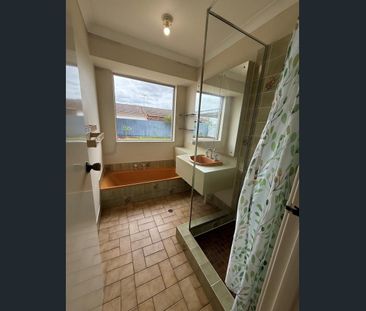 Large backyard with a shed - Photo 5