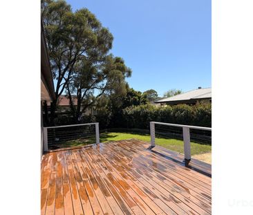 Beautifully Renovated Family Home with Expansive Outdoor Living - Photo 6