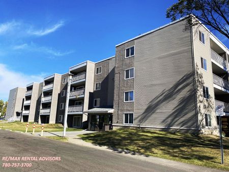 GREAT 2 BED 1.5 BATH 4TH-FLOOR APARTMENT W/AN OUTDOOR PARKING STALL IN THE COMMUNITY OF BELMEAD - Photo 2