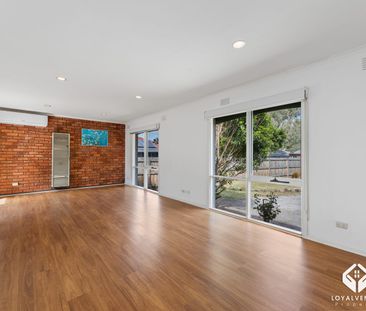 Elegantly Renovated Home in a Sought-After Setting - Photo 1