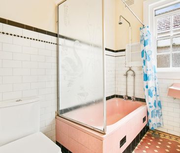 Spacious Two-Bedroom Semi with Sunroom and Outdoor Deck - Photo 4