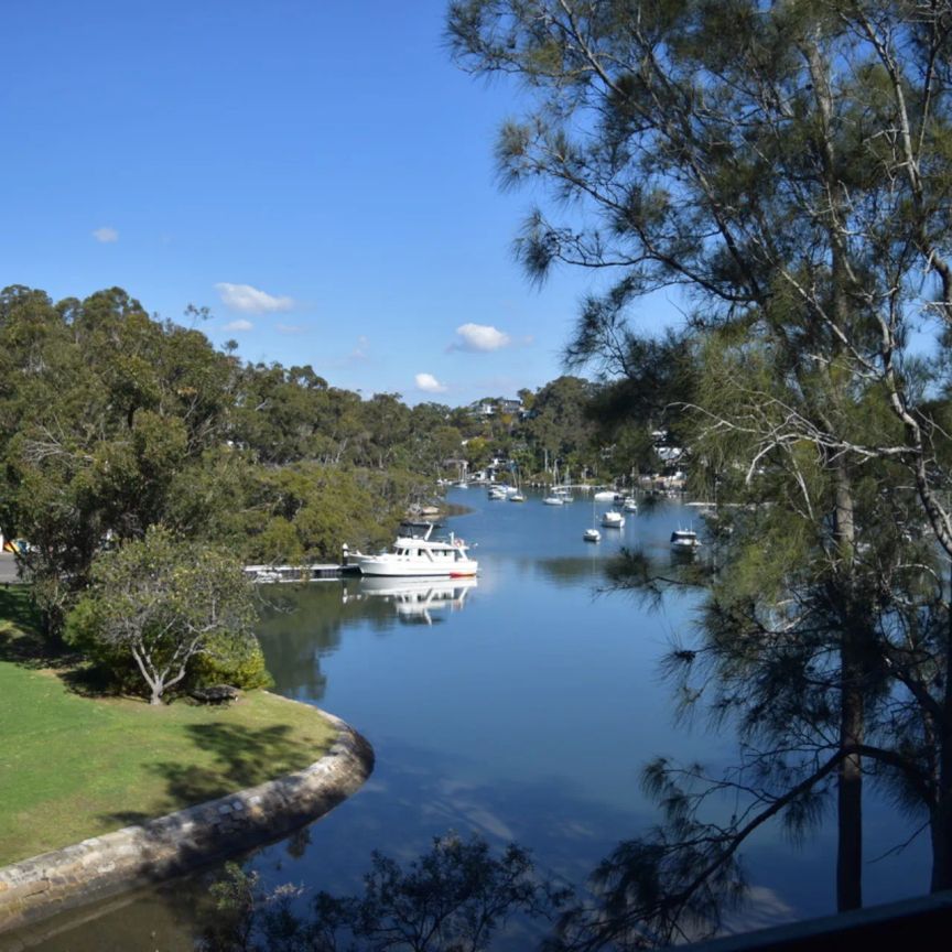 Fully Furnished Apartment with Water Views - Photo 1