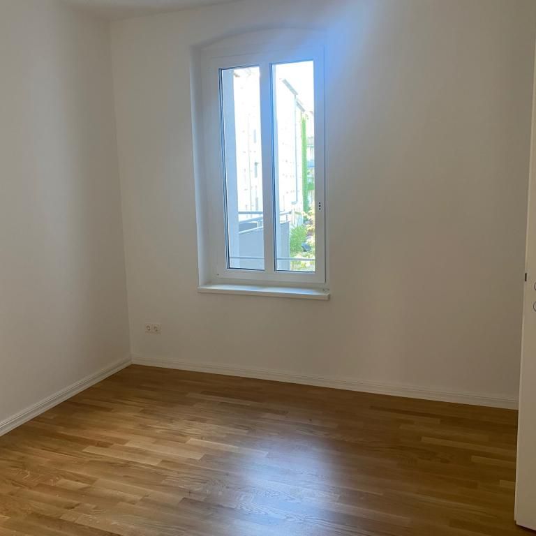 Große Wohnung mit Wohnküche, Balkon und Fußbodenheizung! - Photo 1