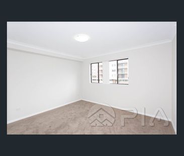 Conveniently Above the Supermarket, Modern Apartment for The Family!! - Photo 1