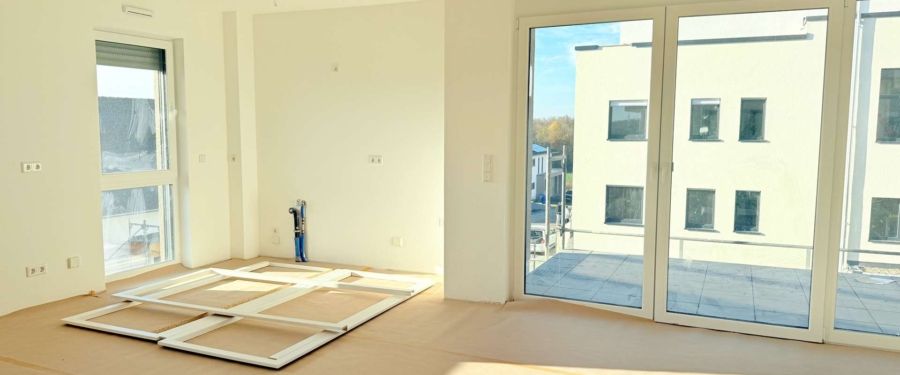 Helle 3-Zimmer-Neubauwohnung mit Balkon in Fernwald-Annerod! - Photo 1