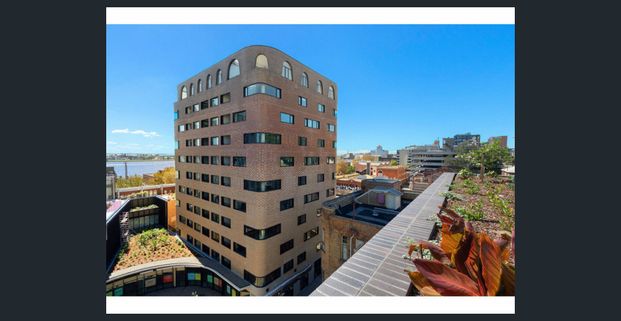 SITUATED IN FABRIC HOUSE LOCATED ON THE 9TH FLOOR WITH FANTASTIC VIEWS - Photo 1