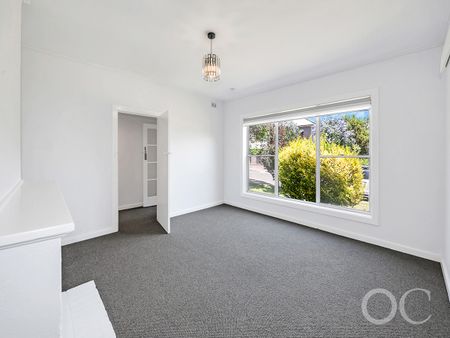 Open the door to coastal living with a sunlit deck retreat - Photo 5