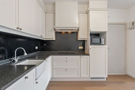 Gelijkvloers appartement met 1 à 2 slaapkamers, tuintje en garagebox - Photo 5