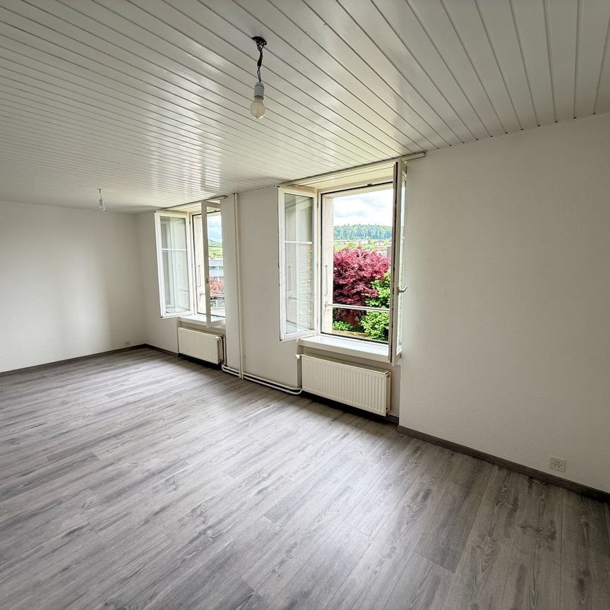 Rez de chaussée - Appartement pratique et abordable avec place de parc et JARDIN COMMUN - Foto 1