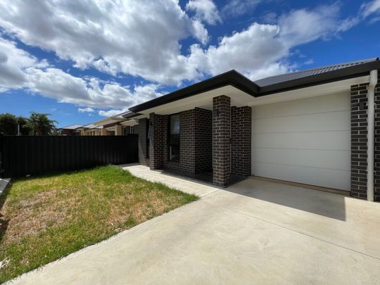 Modern Family Home in Sought after Location - Photo 1