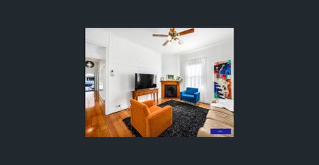 PLENTY OF CHARM IN THIS INNER-CITY ABODE - Photo 5