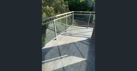 Stylish & Bright 2-Bedroom Apartment with Undercover Parking - Photo 3