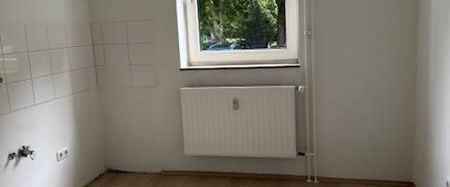 Schicke EG-Wohnung im modernisierten 4-FMH! - Foto 1