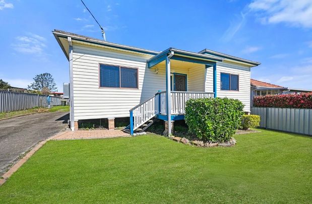 FAMILY LIVING IN THE HEART OF TOWN - Photo 1