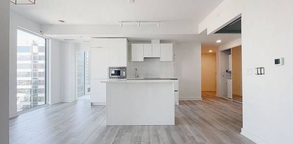 3 Bedroom, 2 Bathroom - Artist's Alley Condos - Photo 2