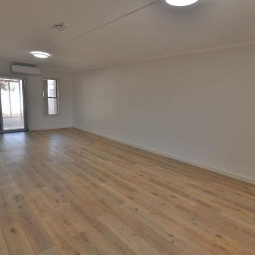 TERRIFIC TOWNHOUSE - 4x1 Renovated + Low Maintenance Yard - Photo 1