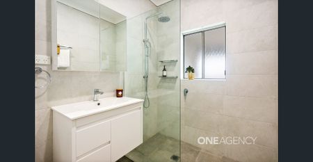 WARM AND WELCOMING FOUR-BEDROOM HOME - Photo 2