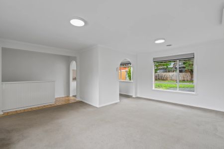Freshly Painted & Light-Filled Family Home in a Prime Location! - Photo 3