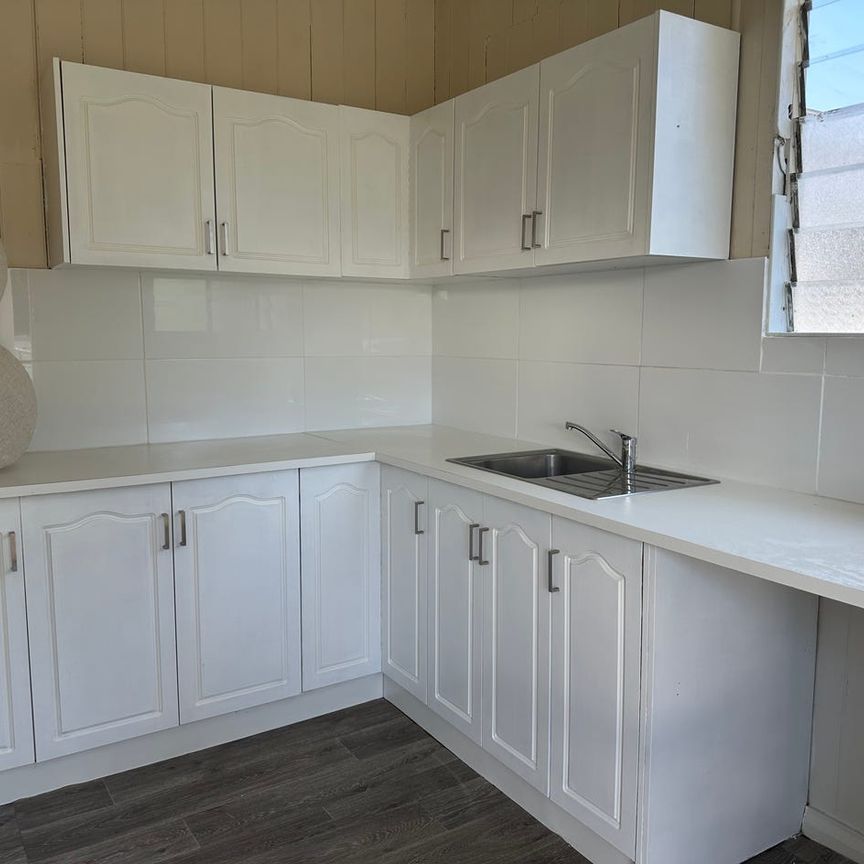 Live in the heart of Sandgate Village - Photo 1