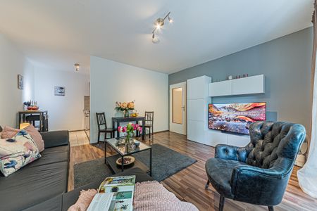 City-Residence: Schick möblierte Wohnung mit Skylineblick in schöner Westendlage - Photo 2