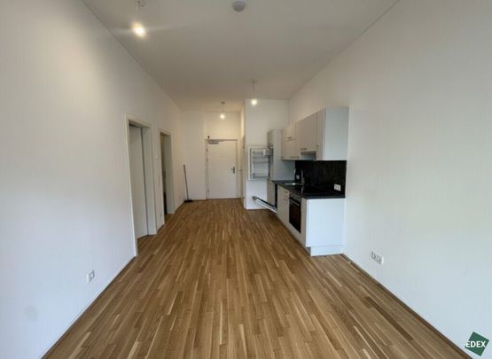 Ab sofort: Moderne 2-Zimmer-Wohnung mit Terrasse und Garten nahe U1 - Photo 1