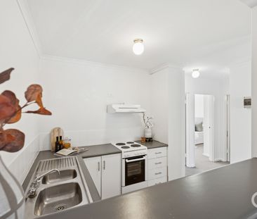 Open the Door to City Living with Comfort and Style - Photo 4