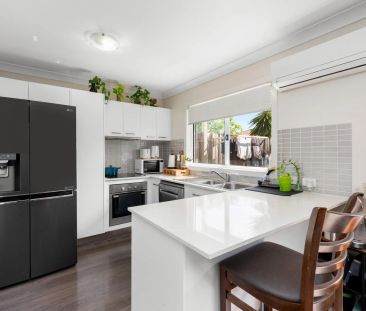 Private Family Home in Boutique Complex with Low-Maintenance Living - Photo 1