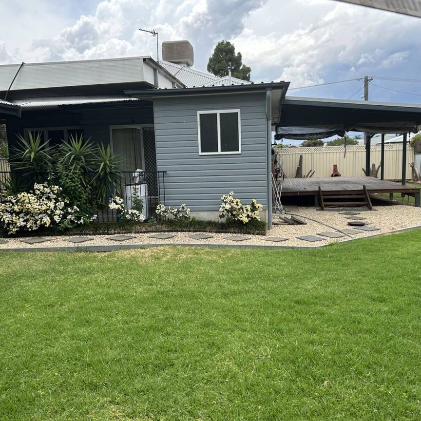 THREE BEDROOM TWO BATHROOM HOME - Photo 1