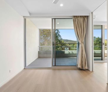 Stylish North-Facing 1-Bedroom Apartment with Sweeping Mountain Views - Photo 2