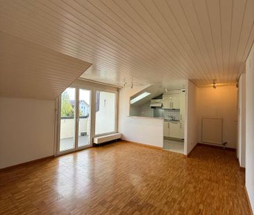 2.5-Dachzimmerwohnung im 2. Stock mit Balkon - Foto 1