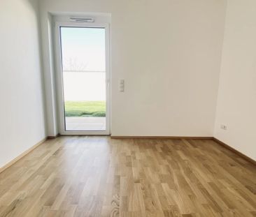 Moderner Wohnraum mit Gartenanteil: Helle 2-Zimmer-Wohnung - Foto 1