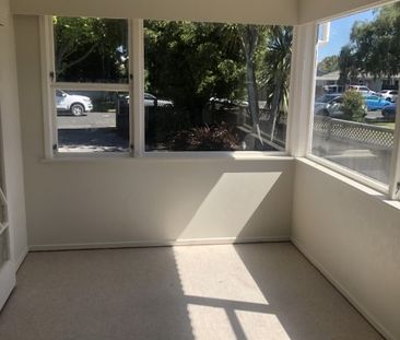 Step into this lovely, easy-care three-bedroom brick home with year... - Photo 1