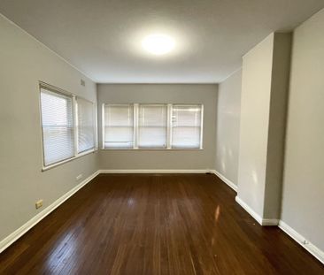 Large two bedroom ground floor unit with single garage - Photo 1