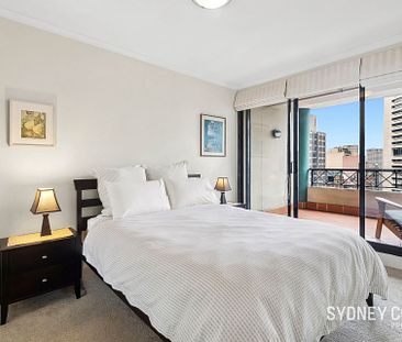 HIGH FLOOR MARTIN PLACE APARTMENT | Furnished - Photo 4
