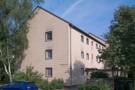 Beliebtes Erdgeschoss: 3-Zimmer-Wohnung mit sonnigem Balkon und Grünblick - Photo 4