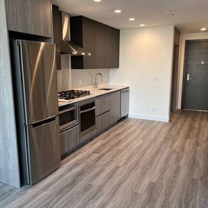 BRAND NEW 1 Bedroom Condo at The Grand Surrey Central - Available NOW - Photo 2