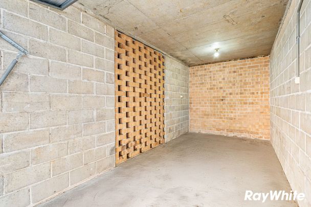 Renovated top-floor unit positioned at the rear of the complex, walk to Top Ryde City - Photo 1